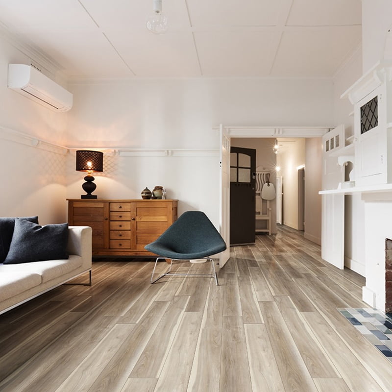 spacious living room with tan floors and modern decor