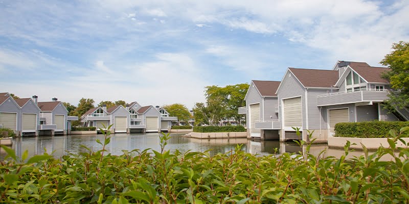 boathouses on lake with new siding