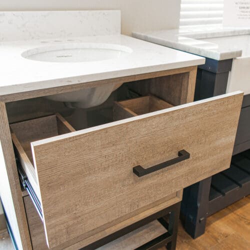 drawer open on wood grain vanity