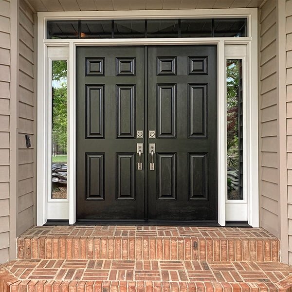 black french doors on brick front porch