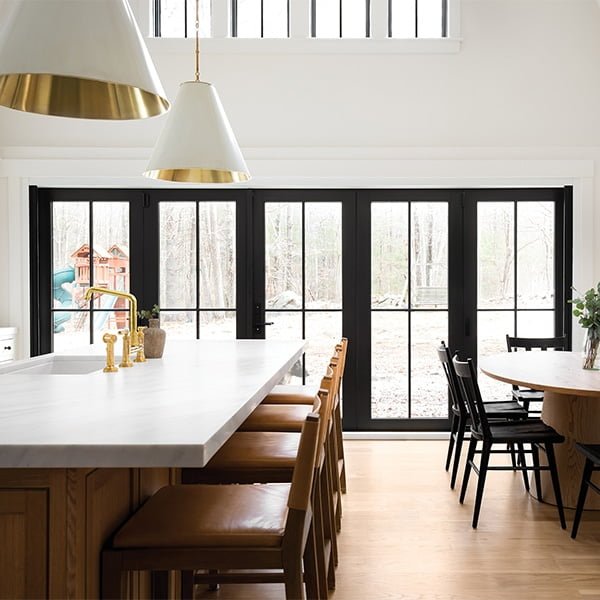 large black patio door leading into backyard