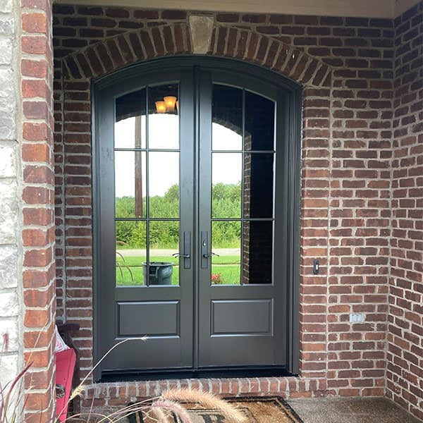 arched top french doors on home