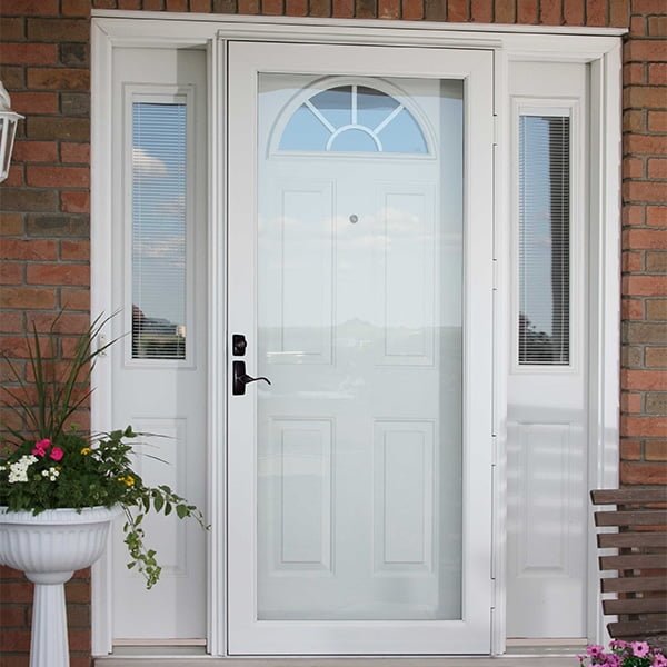 storm door on brick home's entry