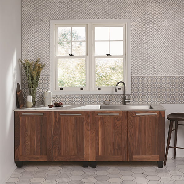 two white double hung windows above kitchen sink in modern home