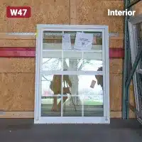 white vinyl window with grids