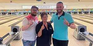 newsletter-thumbnail-2024-08 three adults standing in bowling alley