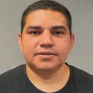 freddys-castillo headshot of adult male with dark hair wearing black shirt