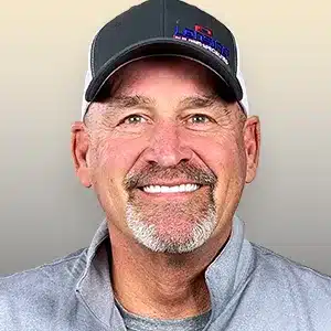 mark-gray adult male wearing dark gray hat and light gray pullover shirt